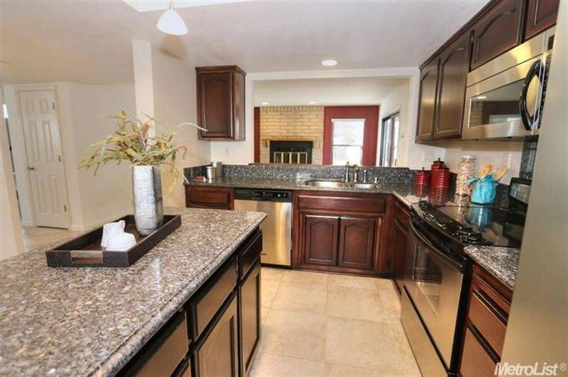 New Caledonia Granite Countertops Pictures Cost Pros And Cons