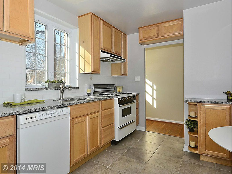 Maple cabinets with new caledonia granite