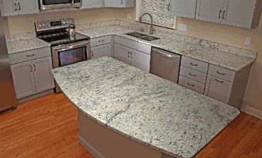 Cream cabinets with white ice granite