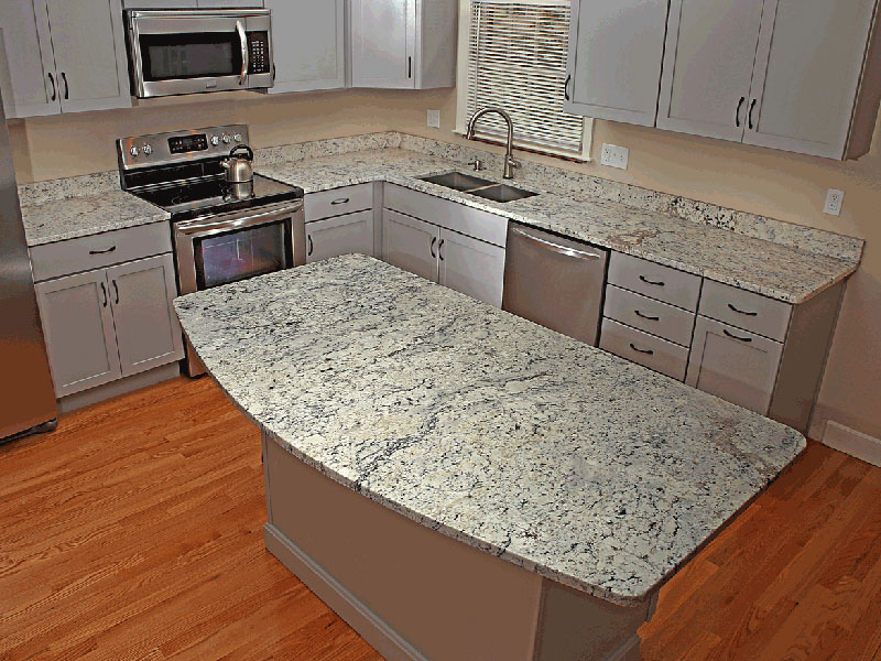 Cream cabinets with white ice granite