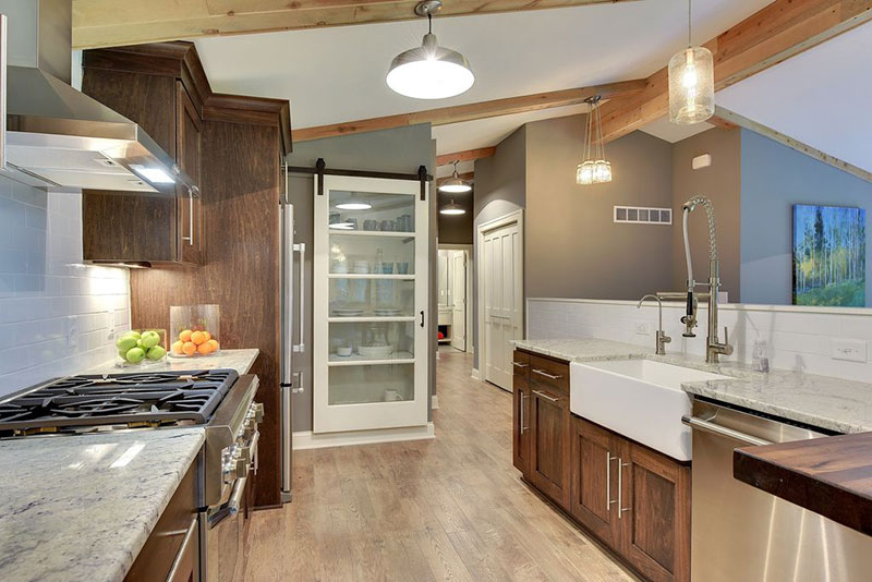 Wood cabinets with white ice granite countertops