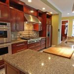 New venetian gold granite with cherry cabinets