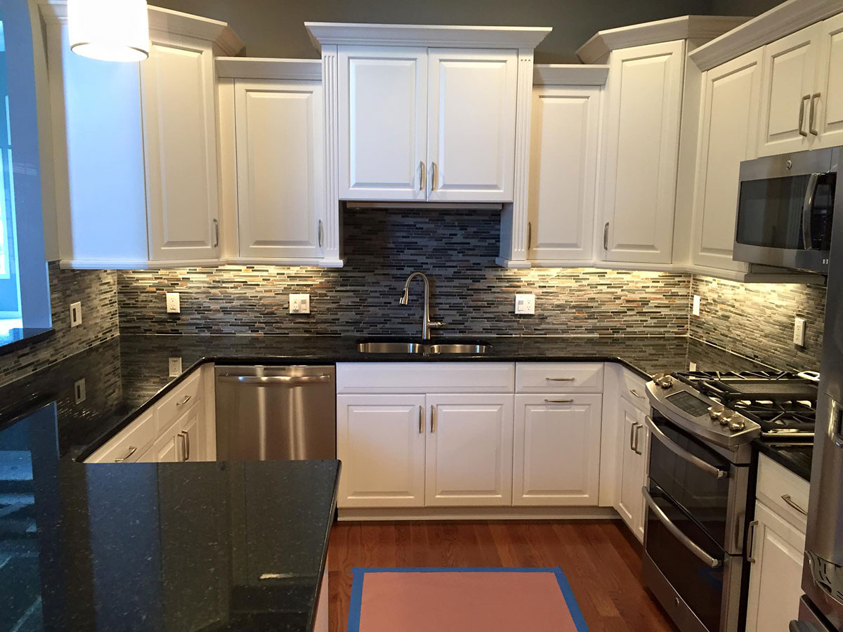 Uba tuba granite with white cabinets