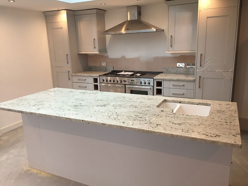 Colonial white granite with gray cabinets