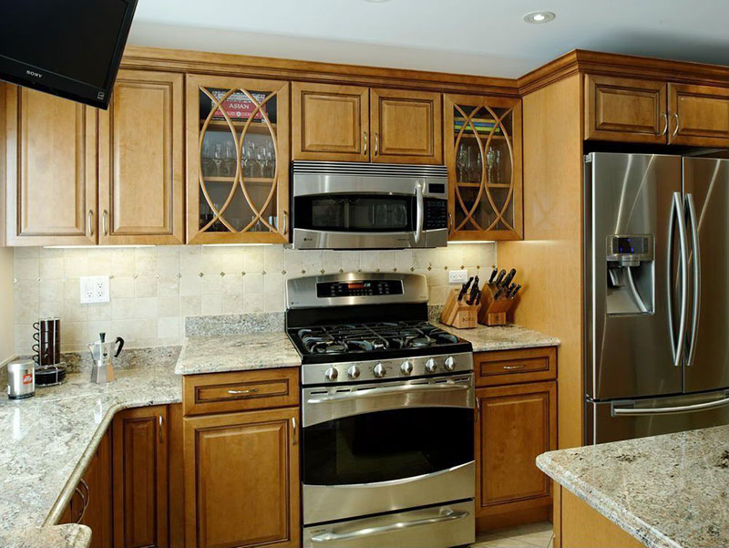 Oak cabinets with white ice granite