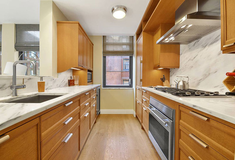 Contemporary kitchen with river white granite