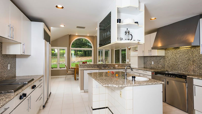 Modern white kitchens with new venetian gold granite countertops and backsplash