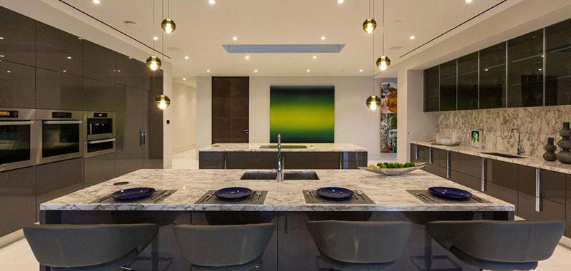 Modern kitchen with river white granite countertops