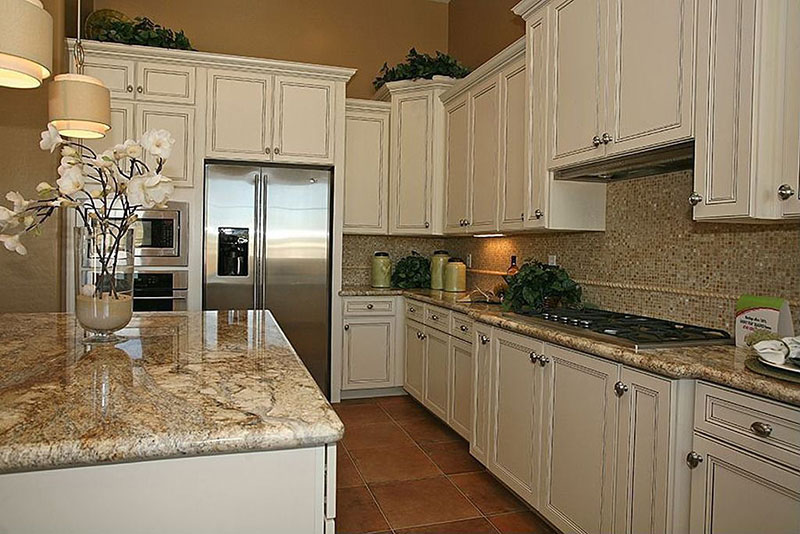 Giallo ornamental granite vs santa cecilia