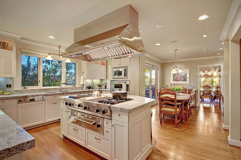 Tansitional kitchen with new caledonia granite