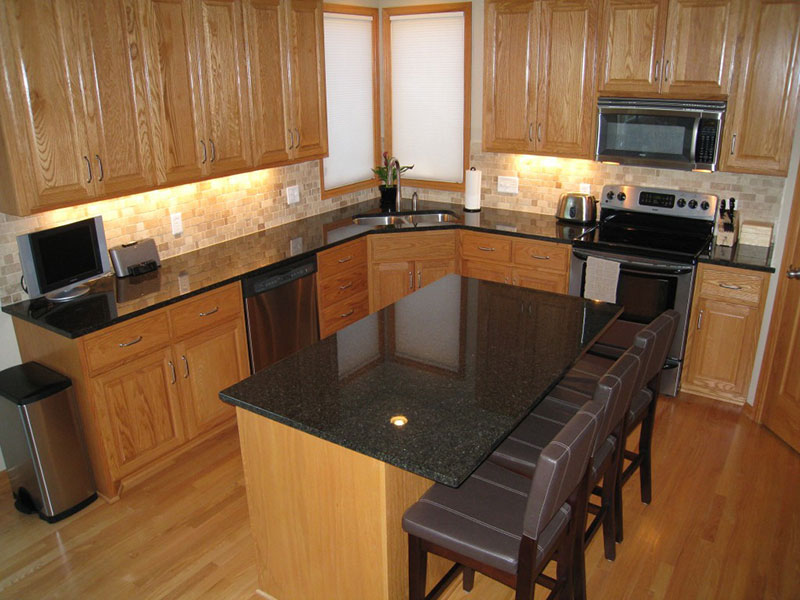 Hickory kitchen cabinets with uba tuba granite