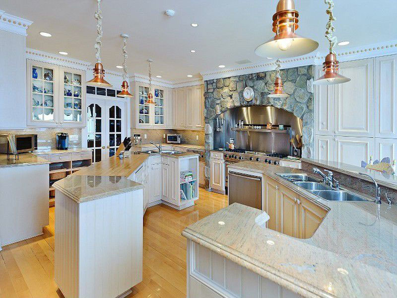 Eclectic kitchen with colonial white granite