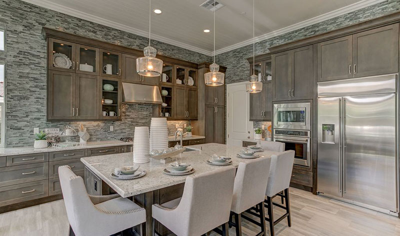 Ttransitional kitchen with bianco romano granite