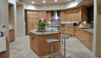 Modern kitchen with bianco romano granite countertops
