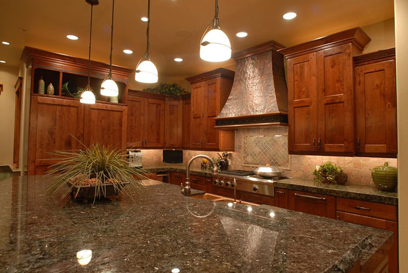 Rustic kitchen with uba tuba granite countertop