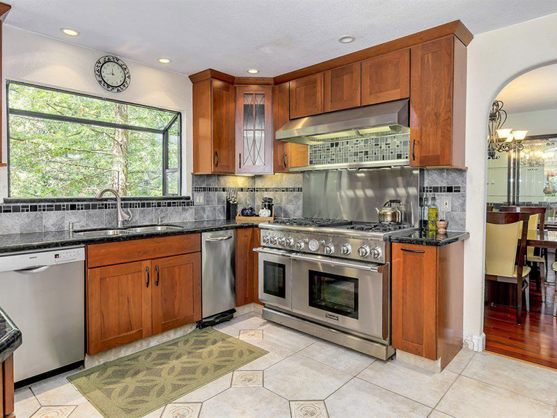 Craftsman kitchen with black pearl granite countertops