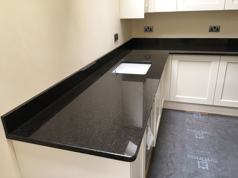 Black galaxy vs black pearl granite countertops