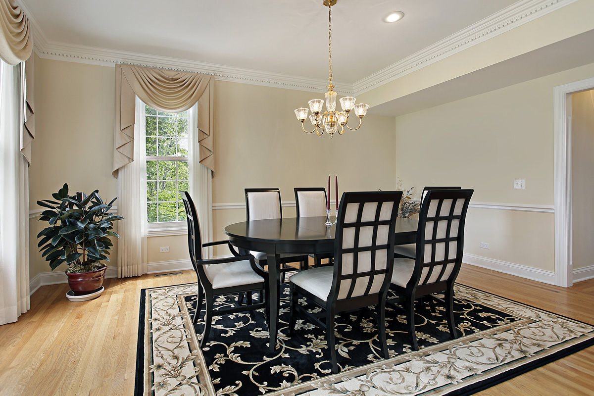 dining room with black and white rug