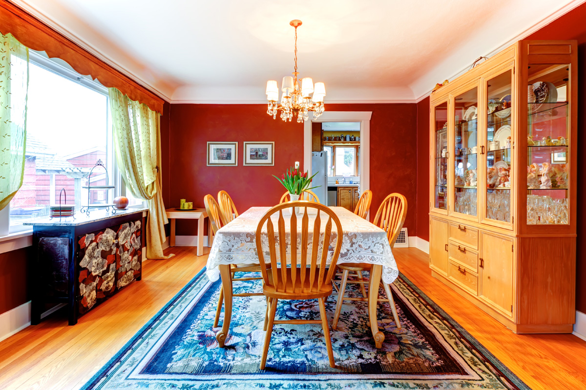 dining room with blue rug