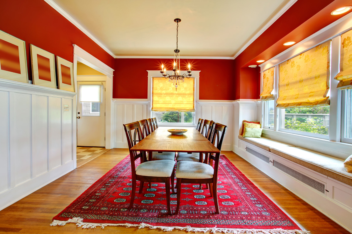 dining room with red rug